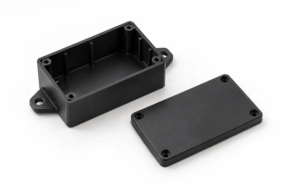 Industrial sensor enclosure with mounting ears and a separate cover