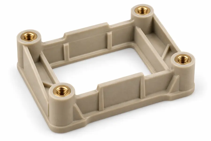 Illustration of a high-temperature plastic mounting bracket with brass threaded inserts