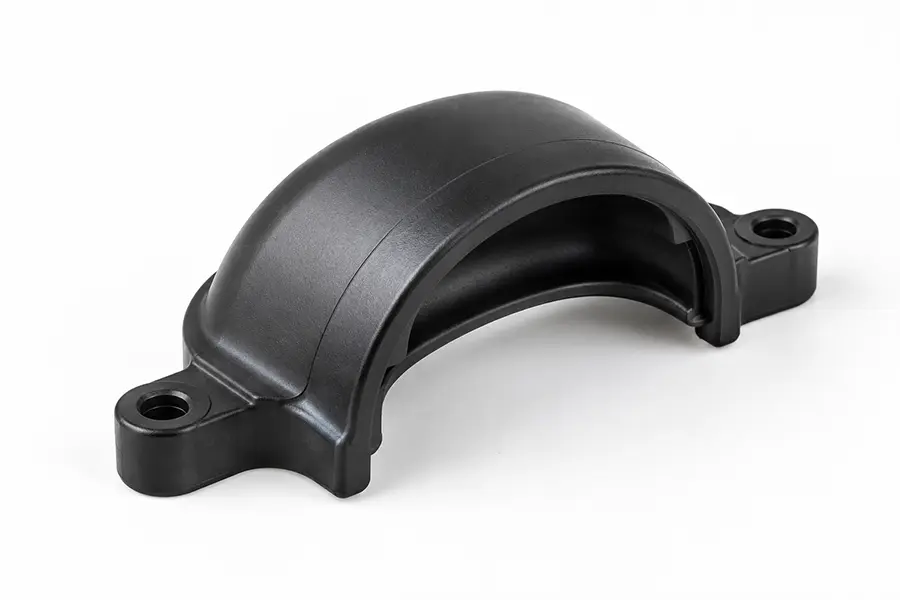 Curved plastic cable protection cover with mounting tabs