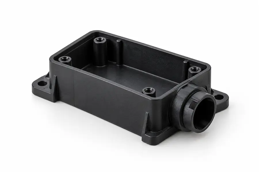 Molded sensor housing with mounting ears and connector opening