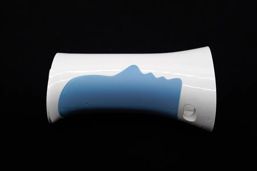 Two-shot molded plastic part